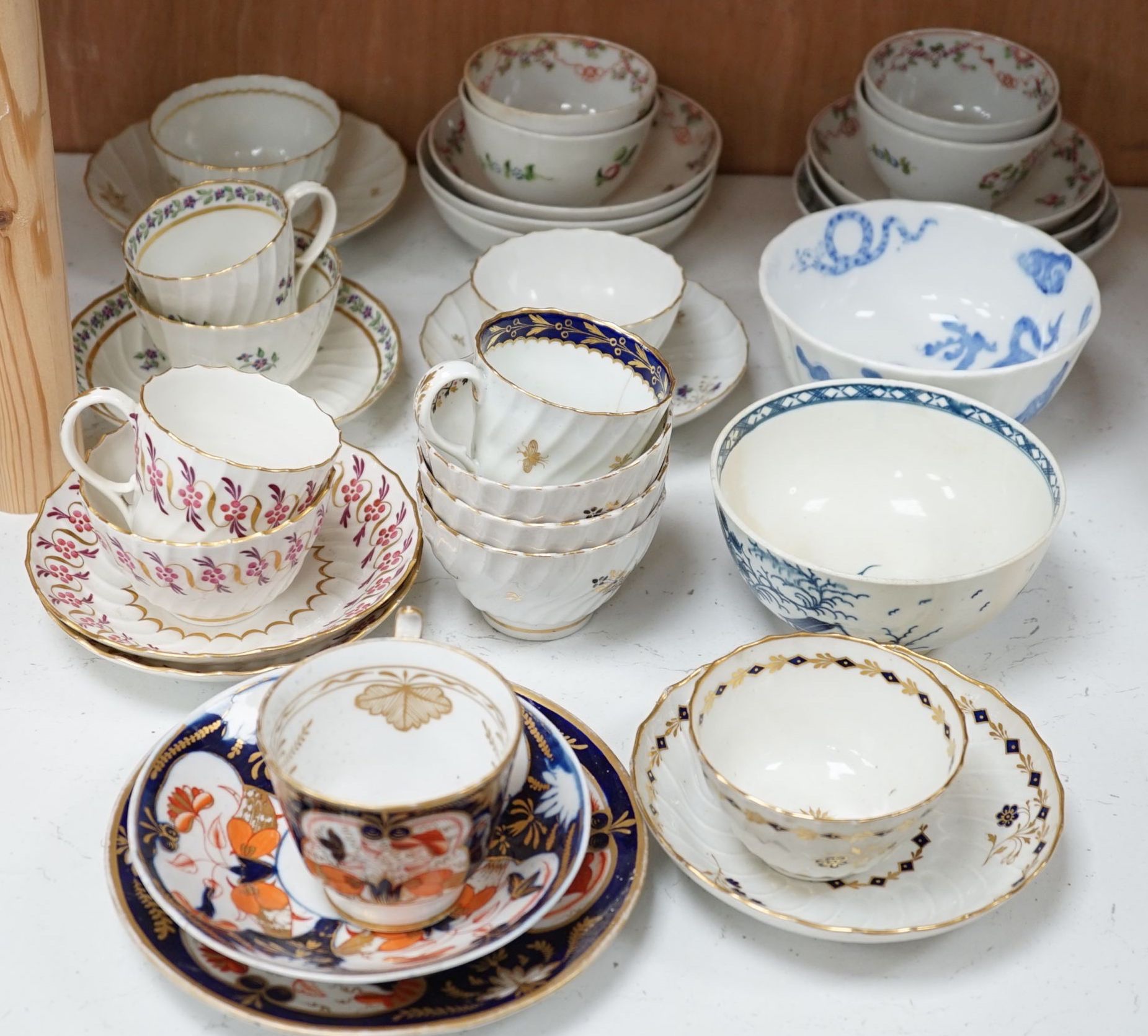 A selection of late 18th/early 19th century English porcelain tea and coffee wares including Worcester and New Hall types